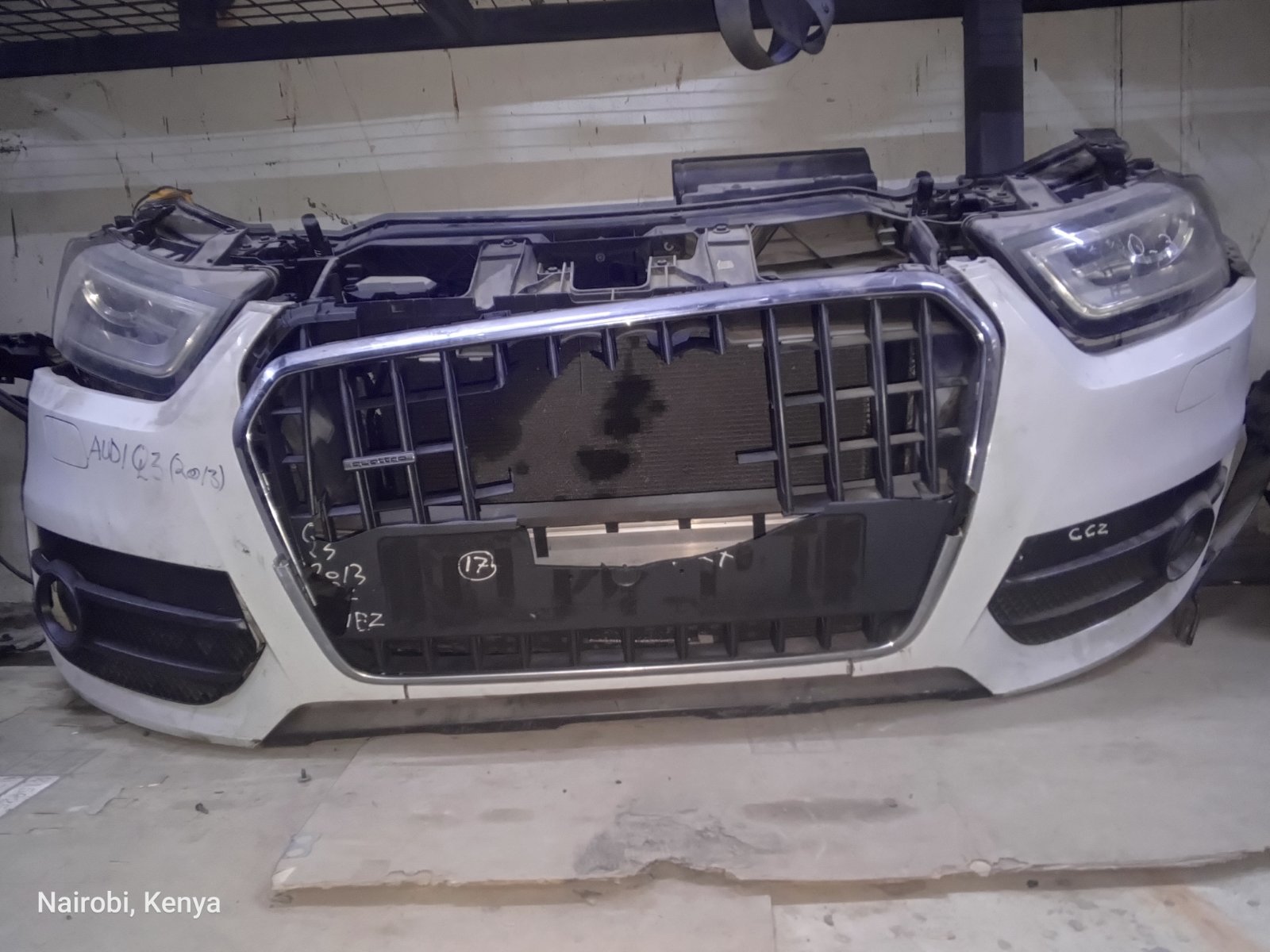 Audi Q3 2013 Front Bumper Assembly with Grille and Headlights